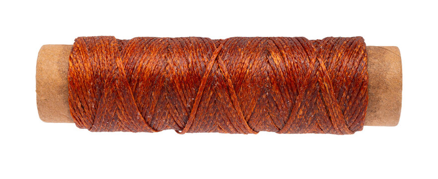 spool of colored thread on a white isolated background