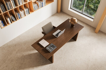 Minimalist interior workspace top view with wooden desk, bookshelves, laptop, elegant lamp and large window light in modern design. 3D Rendering © ImageFlow