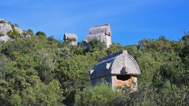 Ancient Lycian sarcophagi on the hillside in Kekova, Turkey