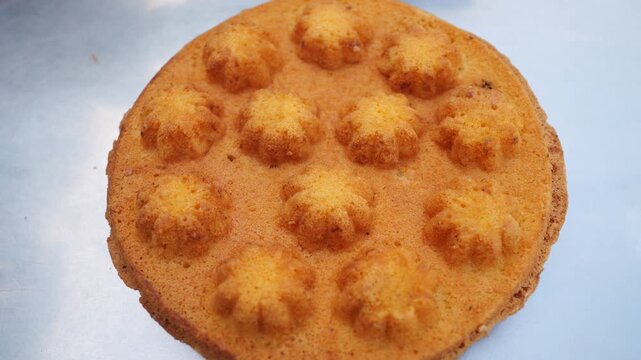Khanom Khai Krob, a traditional Thai dessert that is hard to find, made from flour, eggs and sugar.