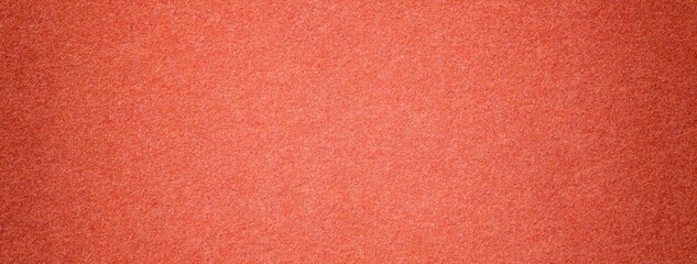 Fototapeta premium Dark coral suede fabric background with matte microfiber texture, soft felt surface with vignette in macro