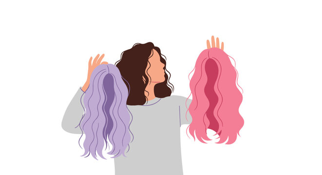 A woman with long dark hair holds a purple wig in one hand and a pink wig in the other on a white background.