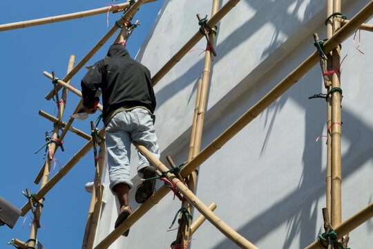Working at heights, The workers are repairing the house, painted
