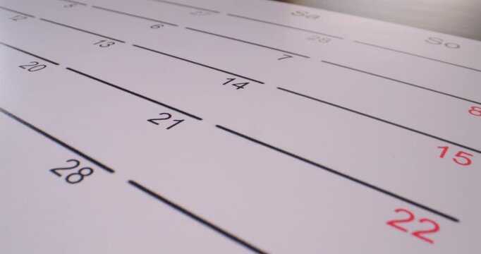 Calendar shows dates with marked days for important events in a simple layout for planning activities