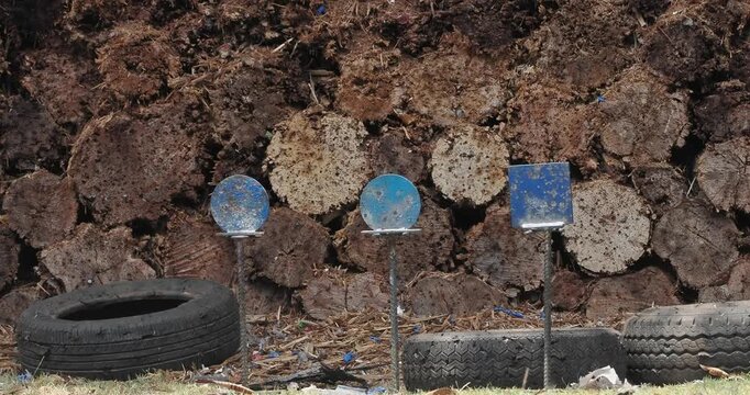 Blue steel target plate for shooting practice.