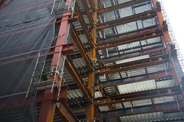 Naklejka premium Steel frame structure of a building under construction