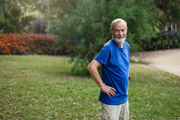 Healthy senior man resting after a workout sport session in the park