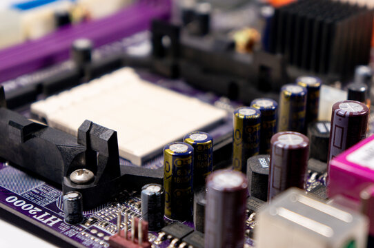 Part of a motherboard with an empty processor socket