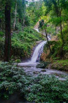 Jae son Waterfall, nestled in the lush greenery of the rainy season, is located in Jaeson National Park, Lampang Province, Thailand.