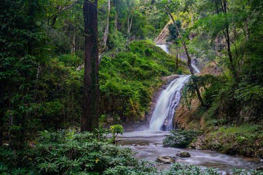 Jae son Waterfall, nestled in the lush greenery of the rainy season, is located in Jaeson National Park, Lampang Province, Thailand.