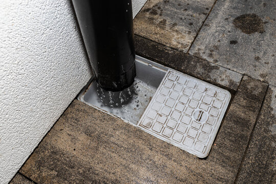 Rainwater draining into settling tank system