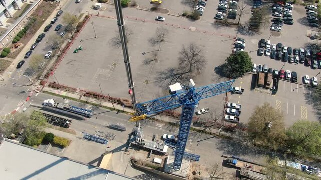 Vertical Drone View of Tower Crane Assembly and Construction Crew in Raleigh