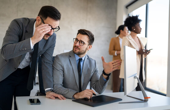 Bankers in a finance office manages portfolios, credit, risk and financial strategy with expertise