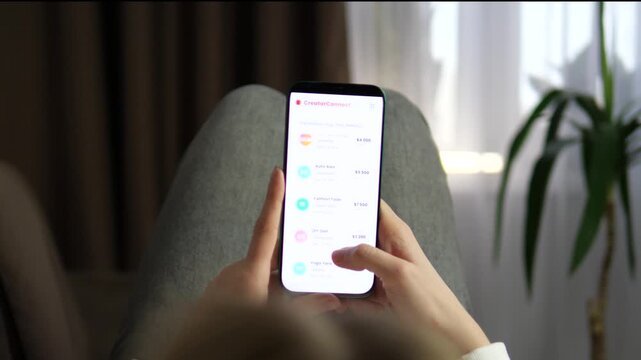 Mobile app interface for connecting brands and creators. User scrolls through an influencer list on a mobile platform. Displays categories, follower reach, and post prices. Perfect for showcasing