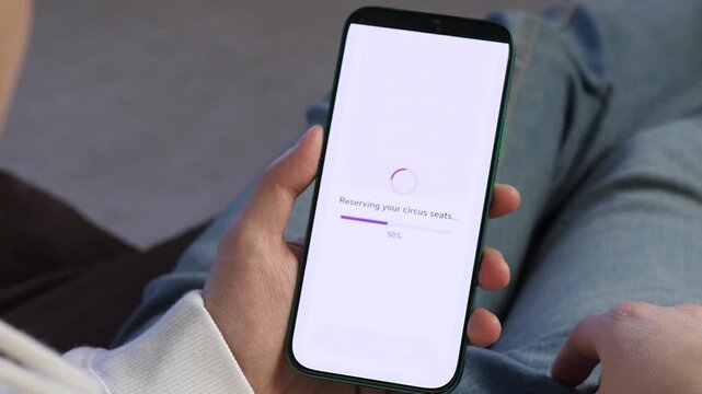 Purchasing Entertainment Event Tickets on Smartphone. Seamless event ticketing on smartphone. Customer selects a premium circus pass and instantly receives a confirmed E-ticket. 