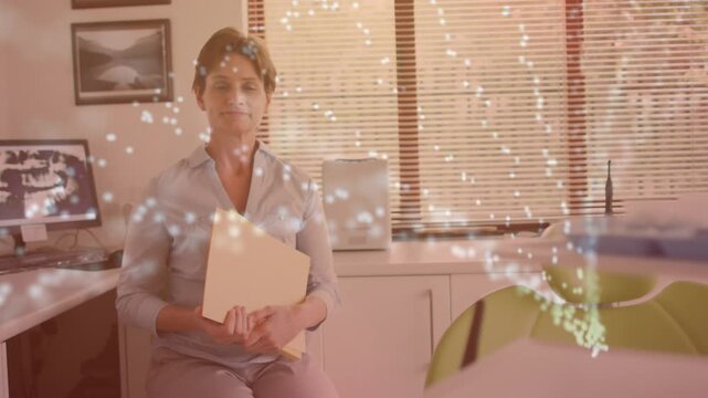 Animation of isoelectric over caucasian businesswoman using laptop in office