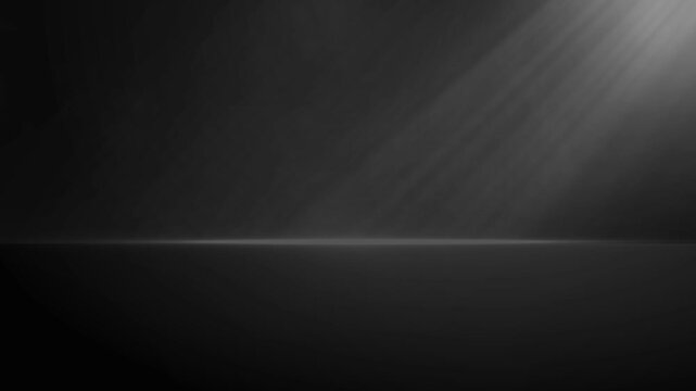 The studio background is black with smoky light.