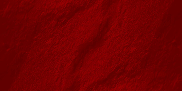 Deep red textured wall background with organic rough plaster surface and soft shadows