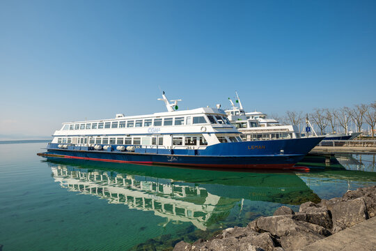 Lausanne, Switzerland, March 21, 2026. Blue Cgn Leman passenger ship docked at Lausanne Ouchy on the calm turquoise waters of Lake Geneva