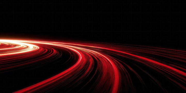 Dynamic streaks of intense red light curve sharply across a dark background creating an illusion of rapid motion.