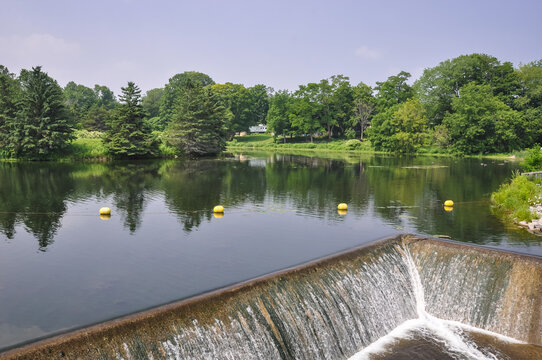 Water flowing over the pond