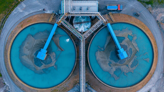 Industrial water treatment facility with sedimentation tanks pulp in copper and gold mining factory, Aerial top view