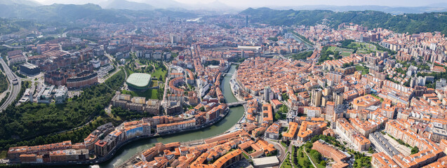  A panoramic aerial view beside the old town of the city Bilbao in Spain, Basque country on a sunny summer afternoon.  © Peter