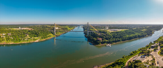 Naklejka premium Aerial panorama of Ponte da Integracao Brasil Paraguai over Parana River near Triple Frontier in Foz do Iguacu Brazil