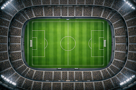 Aerial top view of a full football stadium with perfectly marked pitch and symmetrical design. Balanced composition with crowd texture softly blurred.