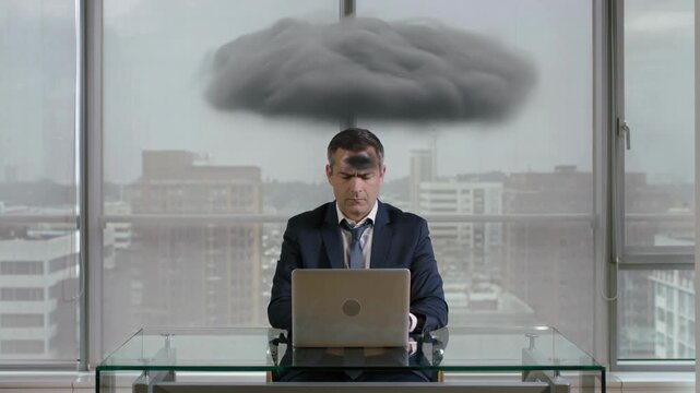 Focused business professional working on laptop in modern office, serious expression, financial analysis, data entry, remote work.