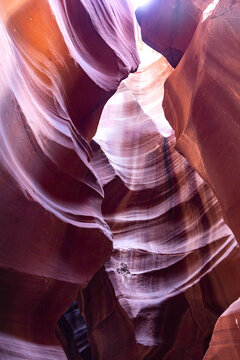 View of the stunning sandstone formations, sculpted by time and light, reveal a symphony of colors within the canyon's embrace, Page, Arizona, United States.