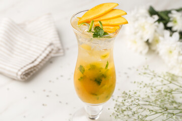 Fresh Mango Mocktail with Mint and Ice in Glass © Adil
