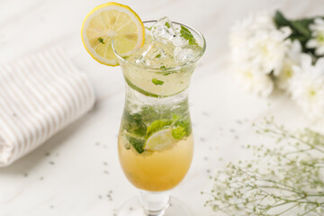 Lemon Mint Mojito Mocktail with Ice and Fresh Herbs © Adil