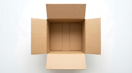 Open Cardboard Box: An empty open cardboard box, viewed from a top-down perspective, showcasing its neat construction and spacious interior, implying potential for packaging and shipping.