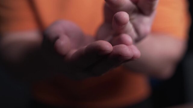 Demonstration of capsule tablets of pills with vitamins, dietary supplements or medicines in the palm of your hand, close-up.