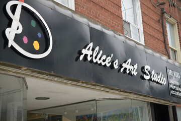 Naklejka premium old sign outside Alice's Art Studio located at 1725 Bayview Av, Toronto