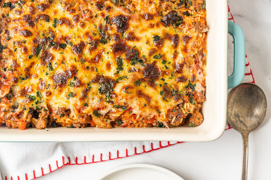 Easy cheeseburger casserole dinner. Easy to make food with cheese, beef, and rice. Simple recipe for busy mom's.