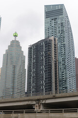 Fototapeta premium looking north to TD Place (161 Bay St), Backstage On The Esplanade condo (1 The Esplanade) and L-Tower condo, designed by Libeskind (8 The Esplanade), Toronto
