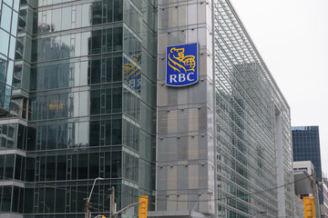 Obraz premium exterior building and corporate logo sign outside RBC Centre located at 155 Wellington St W, Toronto