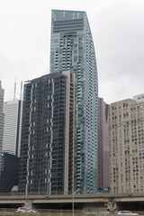 Obraz premium south elevation of 1 The Esplanade and the L-Tower at 8 The Esplanade with towers in the financial district, Toronto