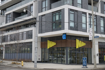 Fototapeta premium exterior building and sign of Maker Pizza Bayview, a pizza restaurant, located at 1674 Bayview Av, Toronto