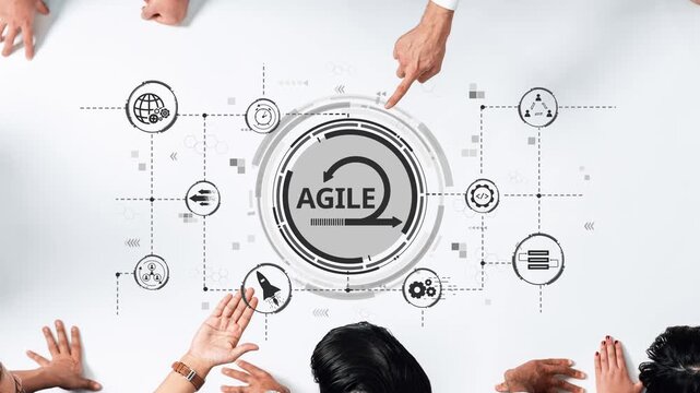 A diverse group of professionals engages in a collaborative discussion on agile methodology, utilizing visual tools and diagrams to enhance project management strategies. Raster