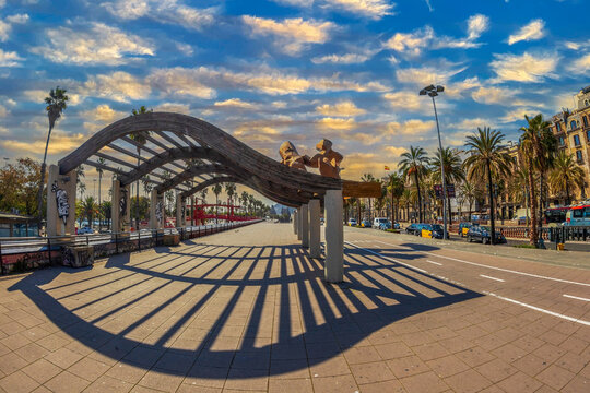 BARCELONA, SPAIN-MARCH 1, 2022: Ronda Litoral-Passeig de Colom in afternoon light, with La Gamba de Mariscal or Gambrinus, a sculpture designed by the Spanish Javier Mariscal.