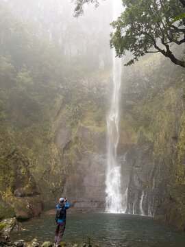 Hiking the scenic 25 Fontes levada trail through the ancient Laurissilva forest in Madeira