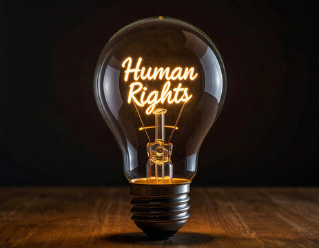 Glühbirne mit einem Glühdraht das aussieht wie das Wort "Human Rights"