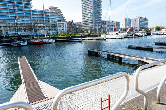 Harbor in Ostend, Belgium. Ships, yachts, buildings, sea in beautiful city.