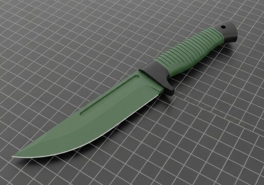 A green tactical knife with a black handle on a grey grid surface