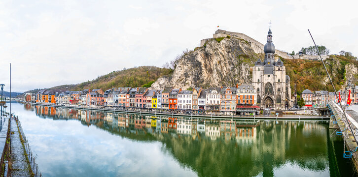 Dinant, Belgium, January 2, 2026: Dinant town reflecting on meuse river cityscape