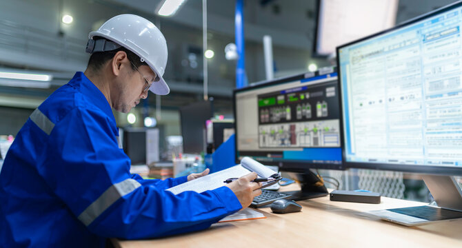 Engineer working at control room,Manager control system,Technician man monitoring program from a lot of monitor