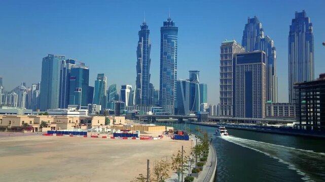 The futuristic city skyline and Dubai Creek, Dubai, UAE